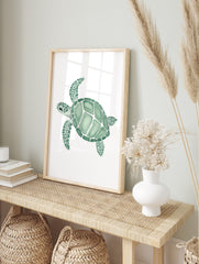 Green sea turtle watercolour illustration art print with patterned shell and flippers on, in an alternate framed mockup