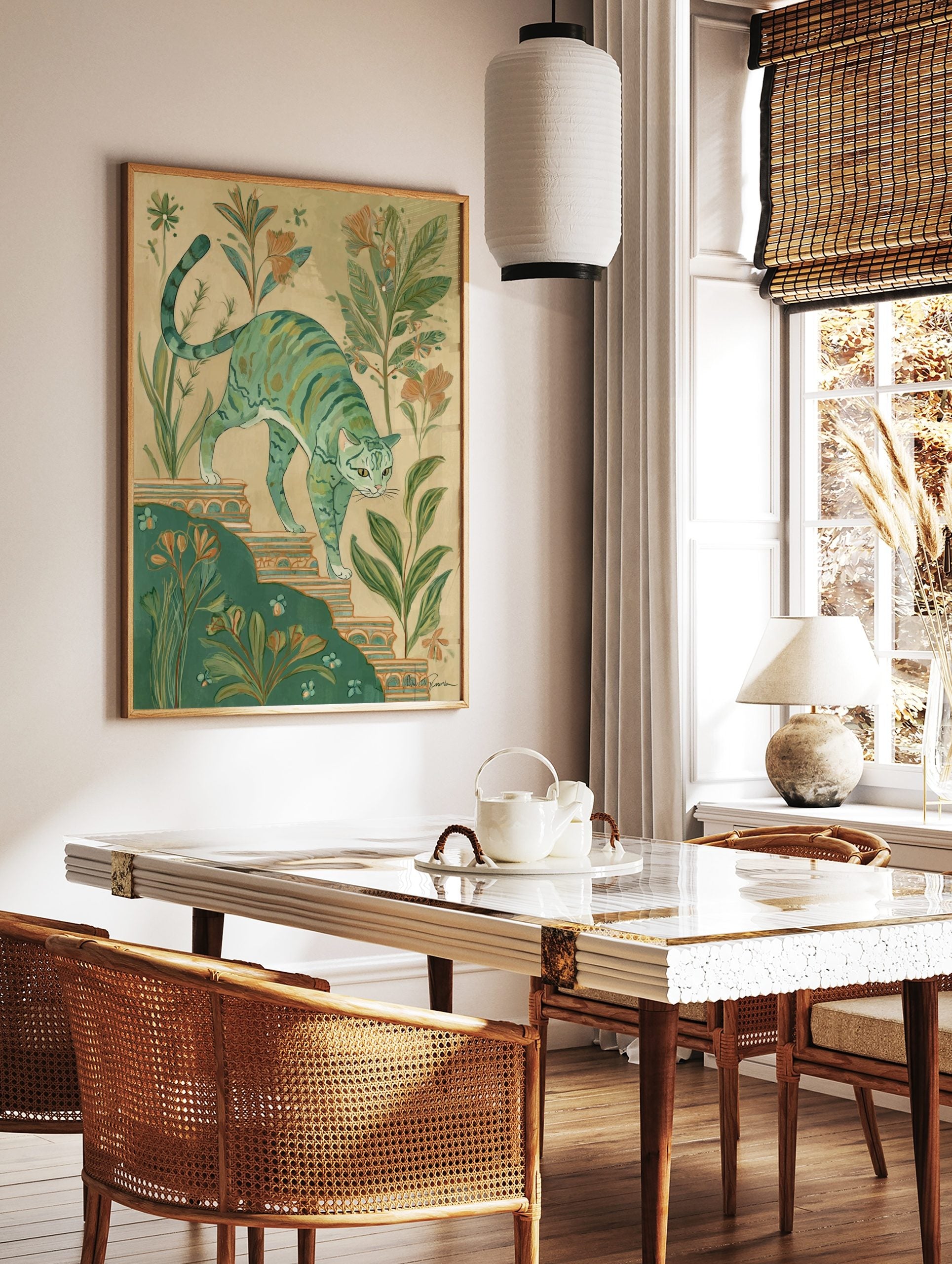 Illustrative green striped cat walking down ornate steps amidst botanical plants and peach flowers, in a styled room mockup