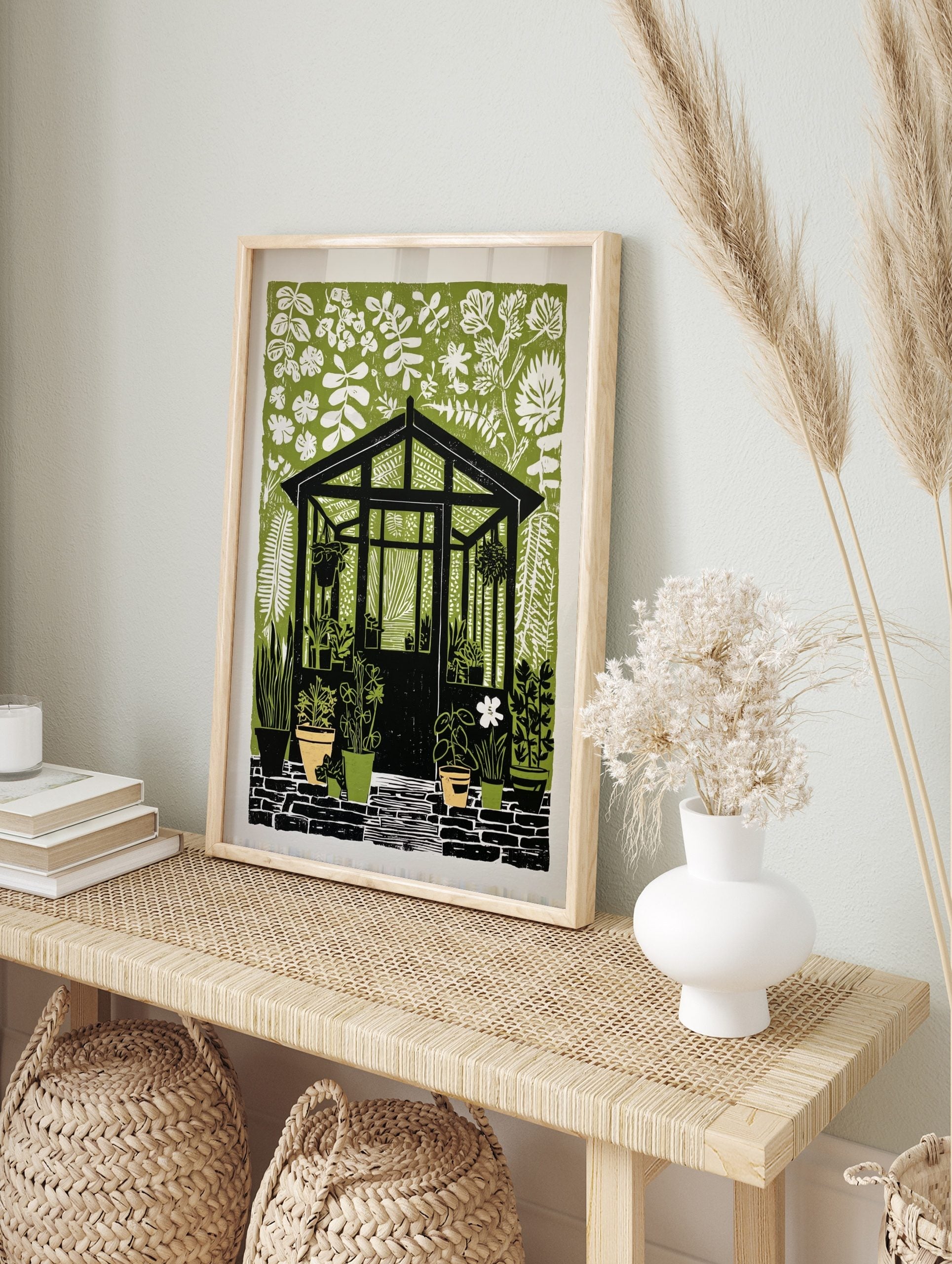 Greenhouse wall art with black structure, white foliage, and potted plants on a green, in an alternate framed mockup