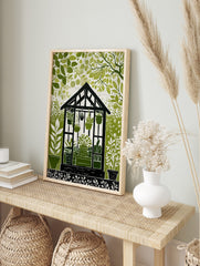 Illustrative green and white greenhouse botanical print with potted plants and surrounding, in an alternate framed mockup