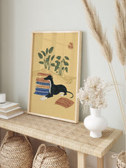 Illustrative art print featuring a black and white Greyhound dog lying on patterned rugs in a desert landscape with green plants. - Image 3