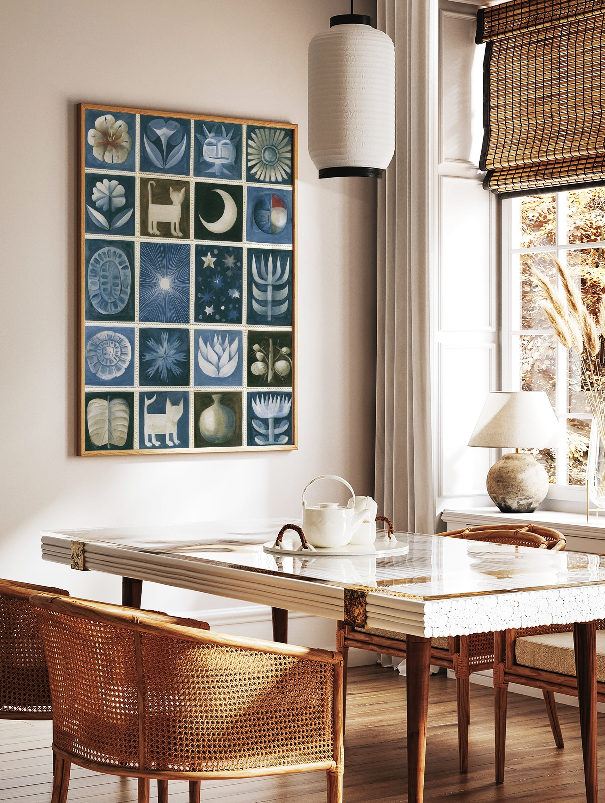 Grid of twenty stylized folk art illustrations featuring cats, flowers, and celestial shapes in, in a styled room mockup
