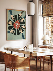 Graphic illustration of multiple hands reaching towards a red and black segmented circular design, in a styled room mockup