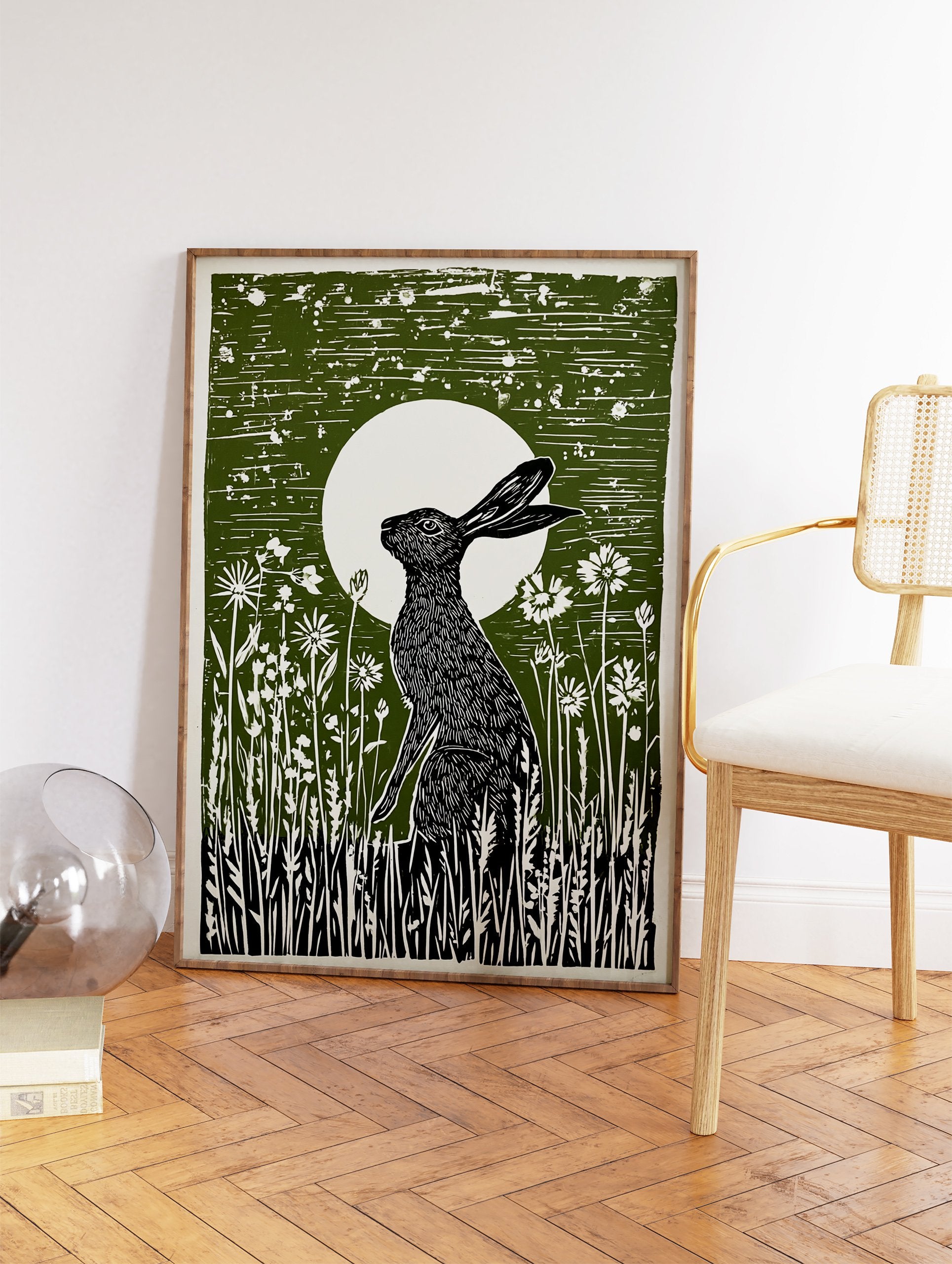 Green linocut print of a black hare sitting in wildflowers under a full moon, capturing a serene nocturnal scene. - Image 2