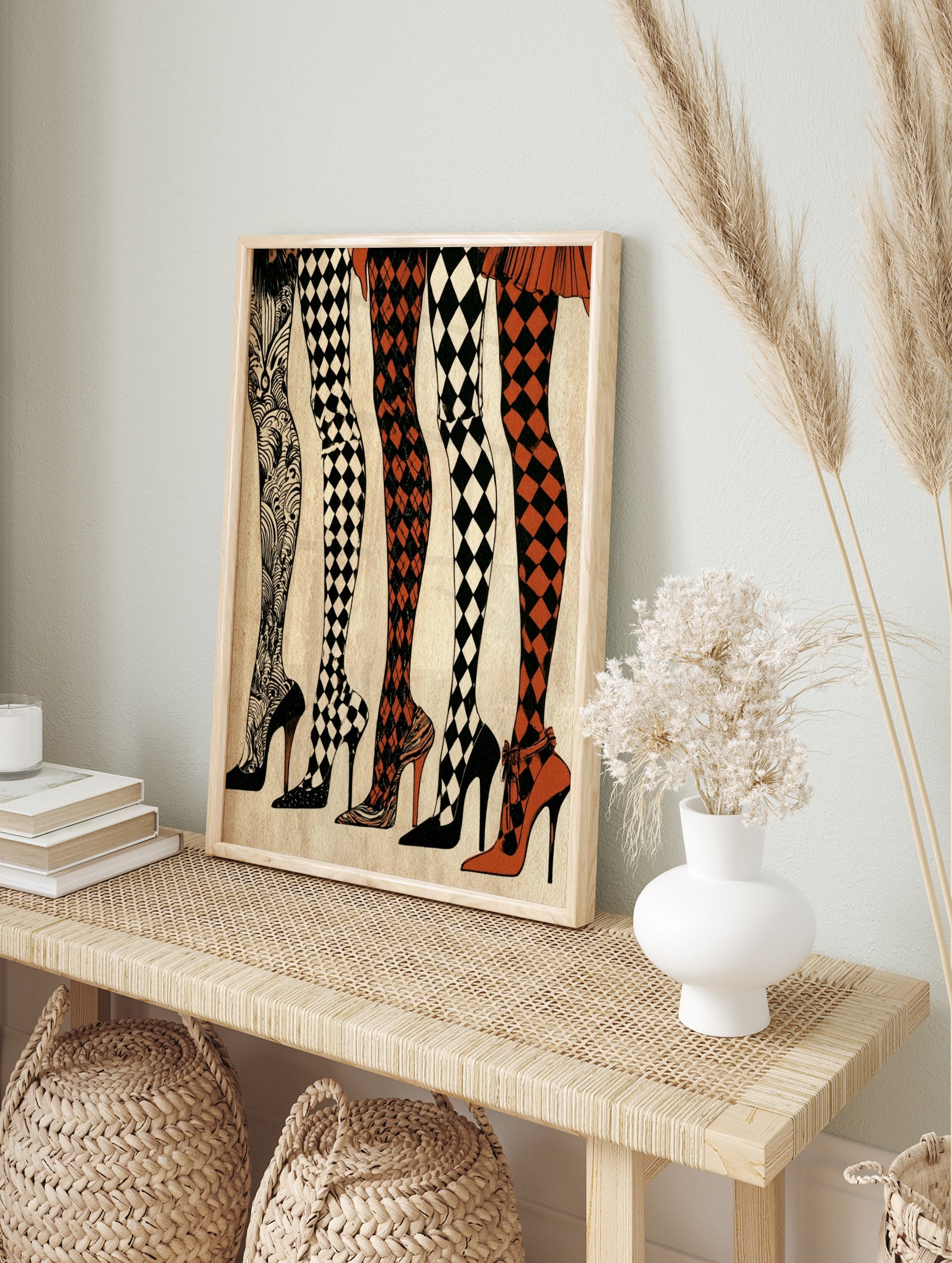 Illustration of five legs in patterned hosiery and high heels, including diamond and swirling, in an alternate framed mockup