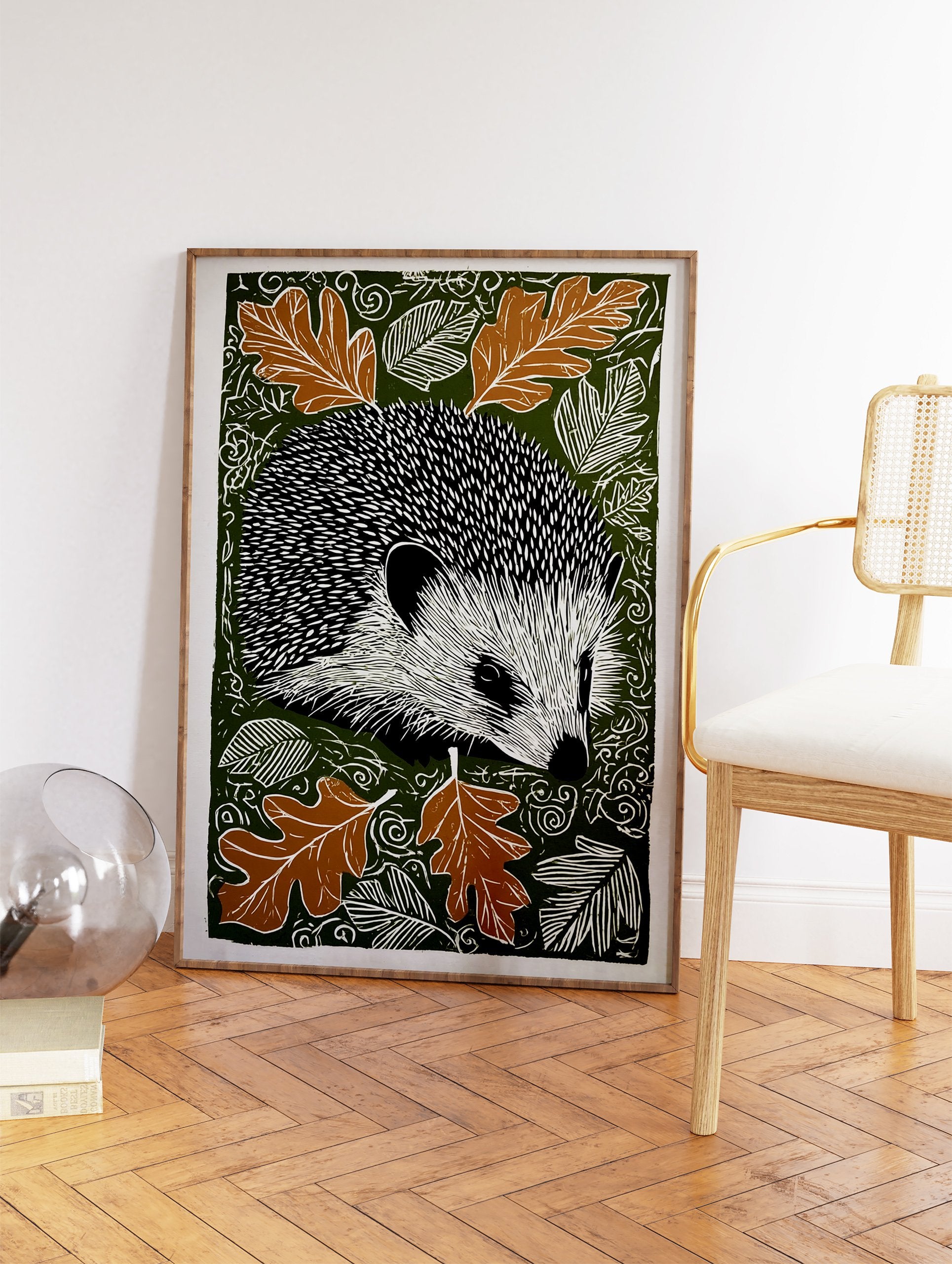 Hedgehog wall art print with black and white hedgehog, brown oak leaves, and white swirling patterns on a dark green background. - Image 2