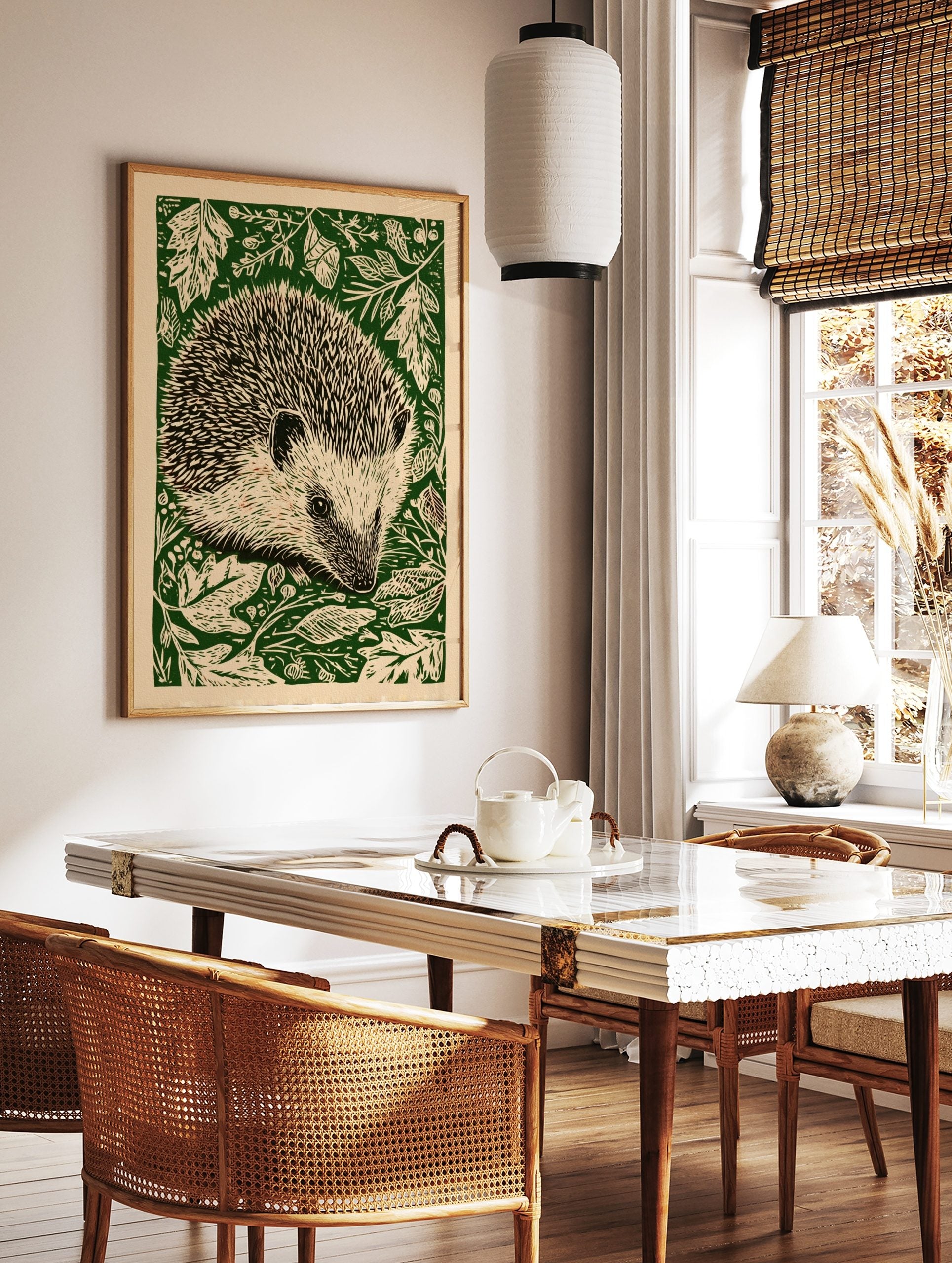 Hedgehog woodcut illustration wall art with quills and forest foliage on a green background, in a styled room mockup