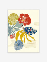 Illustrative hermit crab with blue and red patterned shell, yellow legs, and stylised red, yellow, and blue plants
