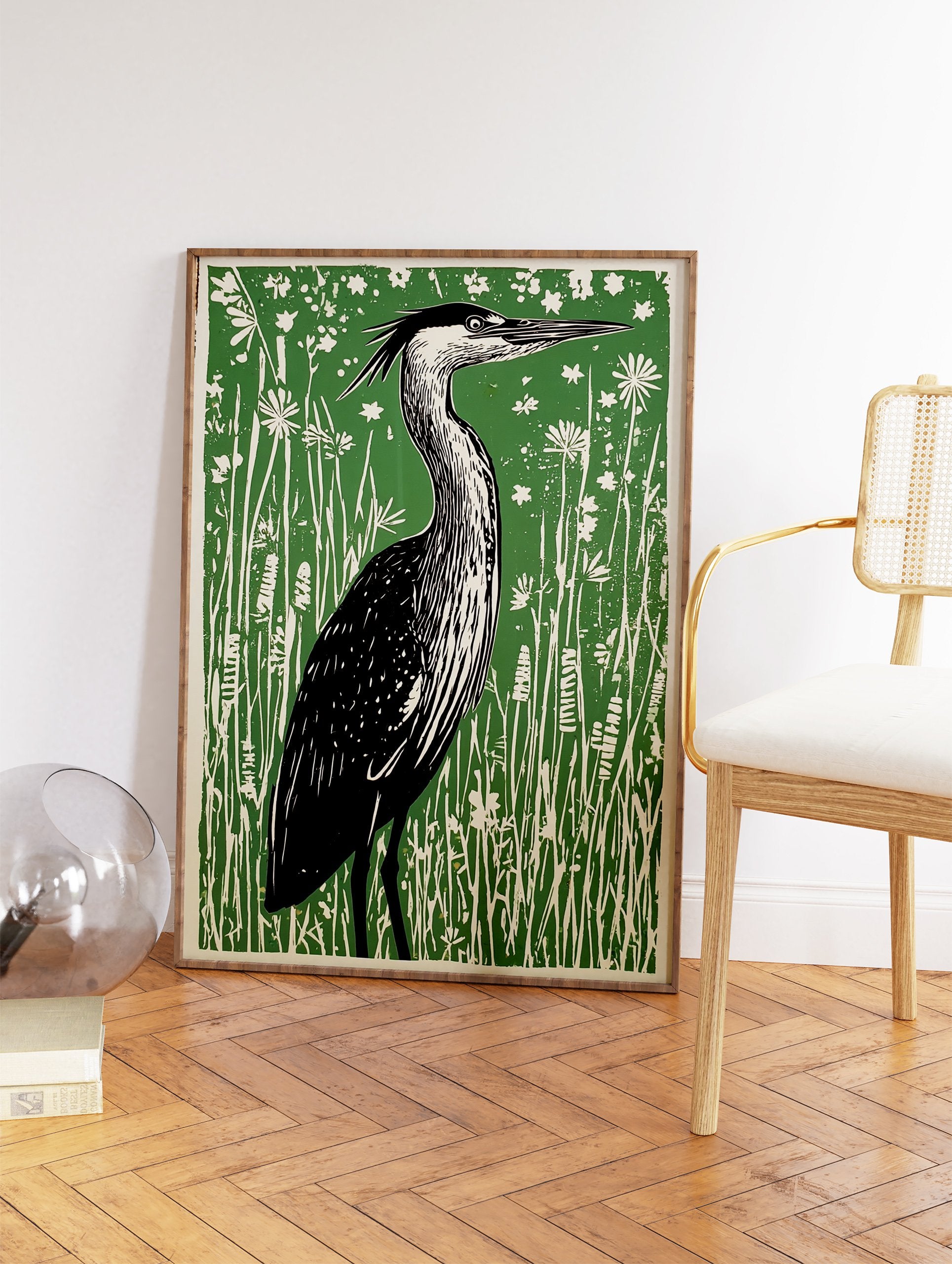 Linocut art print of a heron bird standing in tall green grass and white wildflowers. - Image 2