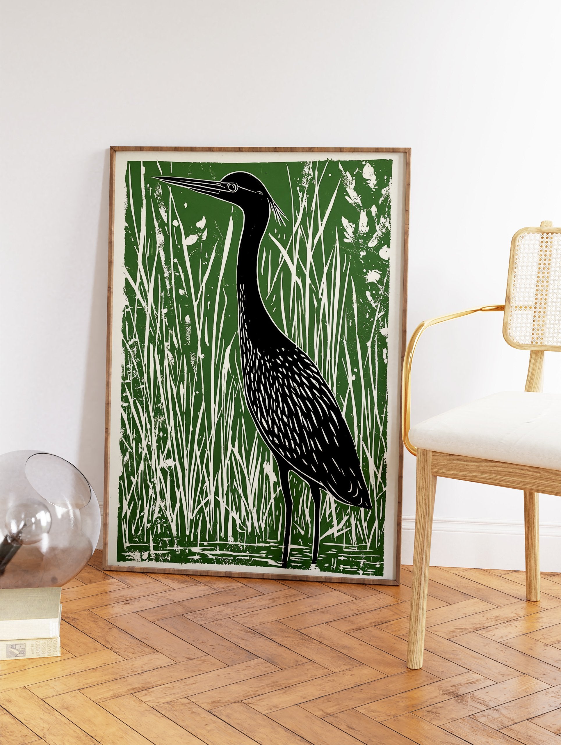Green and black linocut print featuring a heron bird standing in tall marsh grasses, nature wall art. - Image 2