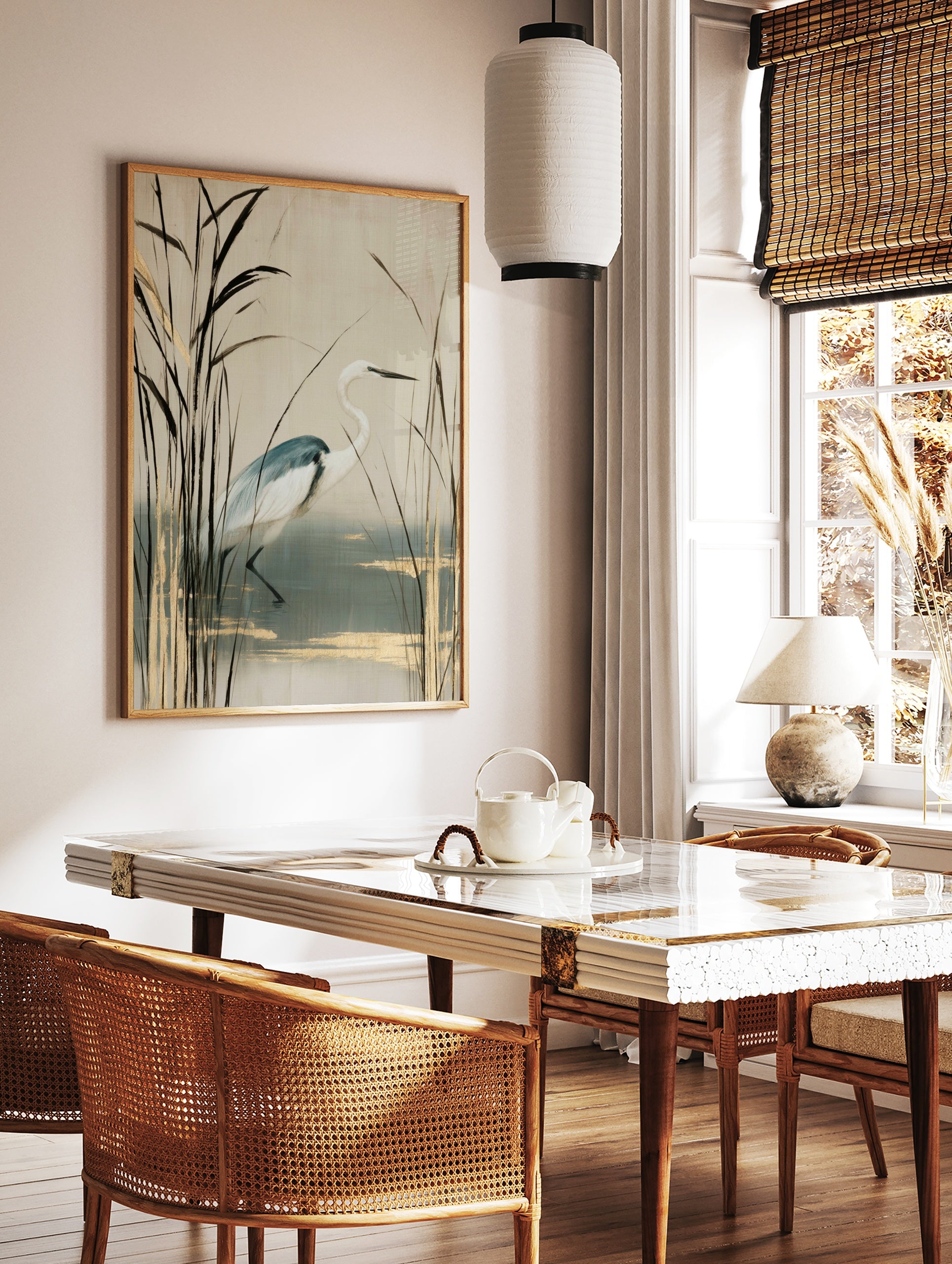 White heron bird standing among tall reeds with gold accents on a cream background, illustrative, in a styled room mockup