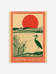 Illustrative art print of a dark green heron by a lake with reeds, rolling green hills, and a large red sun, within an
