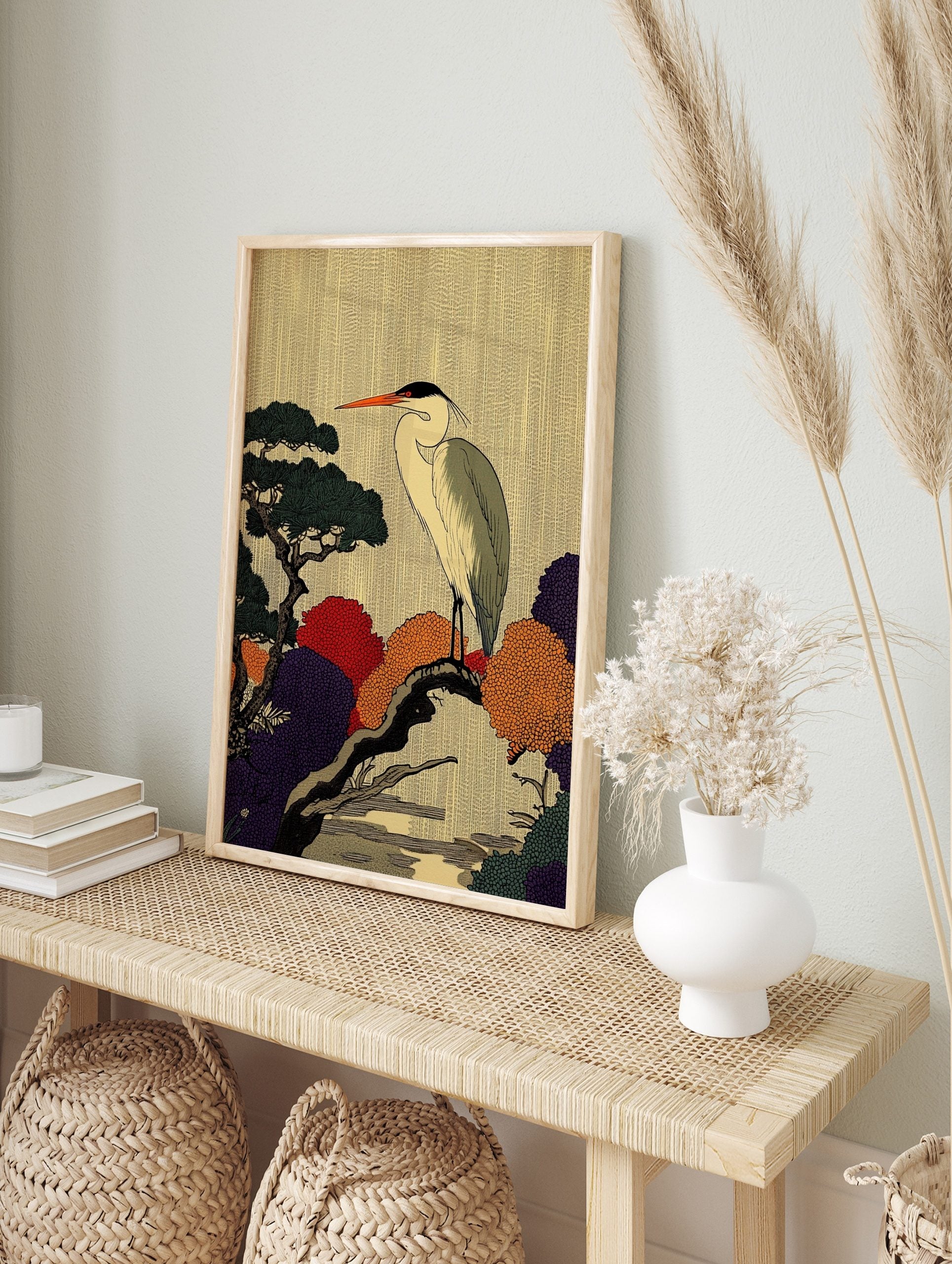 Japanese Ukiyo-e style heron on tree branch art print with colourful red, orange, and purple, in an alternate framed mockup