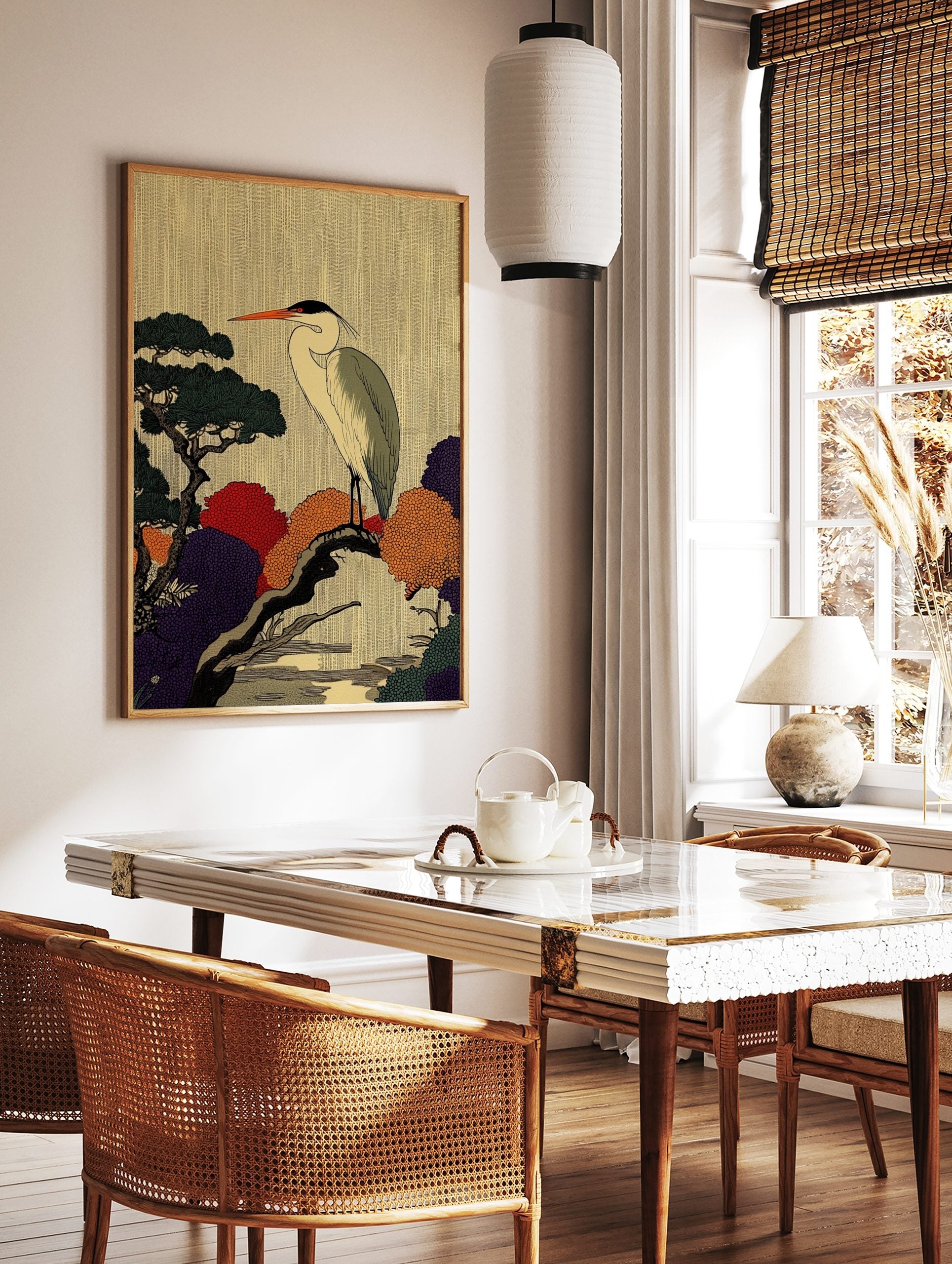 Japanese Ukiyo-e style heron on tree branch art print with colourful red, orange, and purple foliage, in a styled room mockup