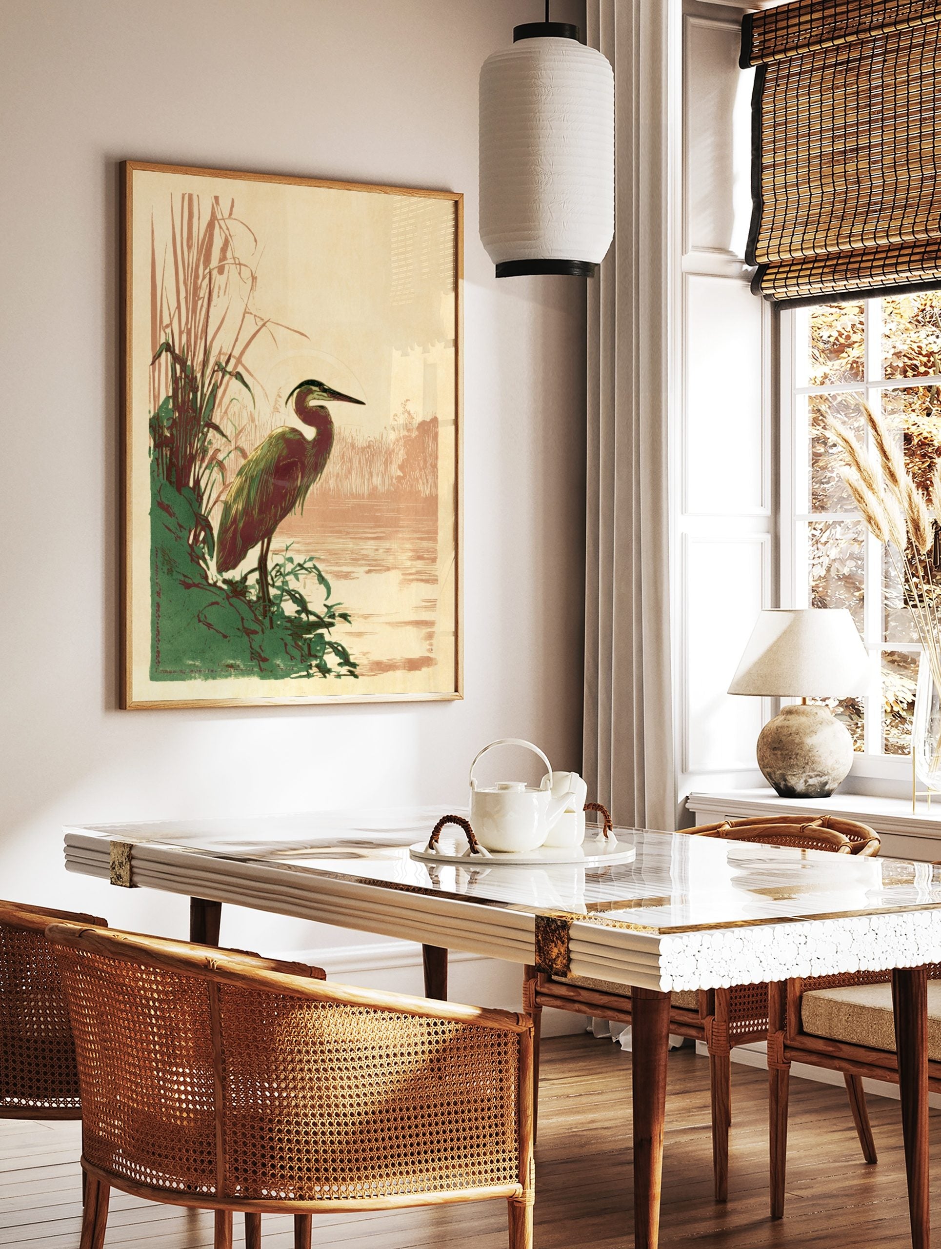 Art Nouveau style illustration of a heron standing by green reeds at a river's edge, with a warm, in a styled room mockup