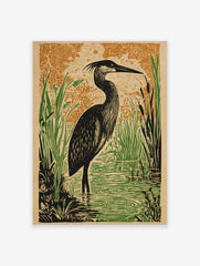 Illustrative heron bird art print in black, green, and orange, standing in a marsh with reeds and patterned background