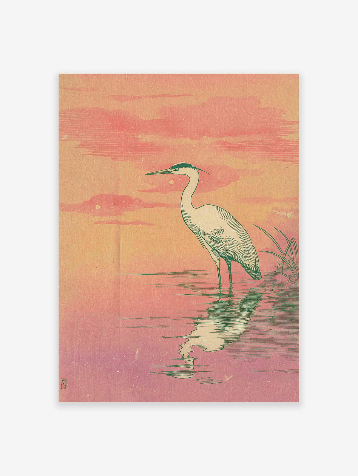 Japanese style heron wall art print featuring a white egret standing in pink and orange water with a sunset sky.