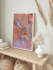 Holographic lobster artwork with iridescent shell and sparkling light effects next to crystal, in an alternate framed mockup