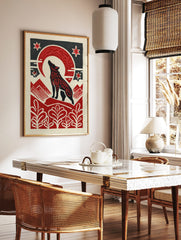 Black howling wolf with red patterns under a red crescent moon and stars, with red mountains and, in a styled room mockup