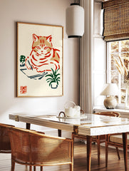 Illustrative cat writing at a desk with plants, in a Japanese woodblock print style with red, in a styled room mockup