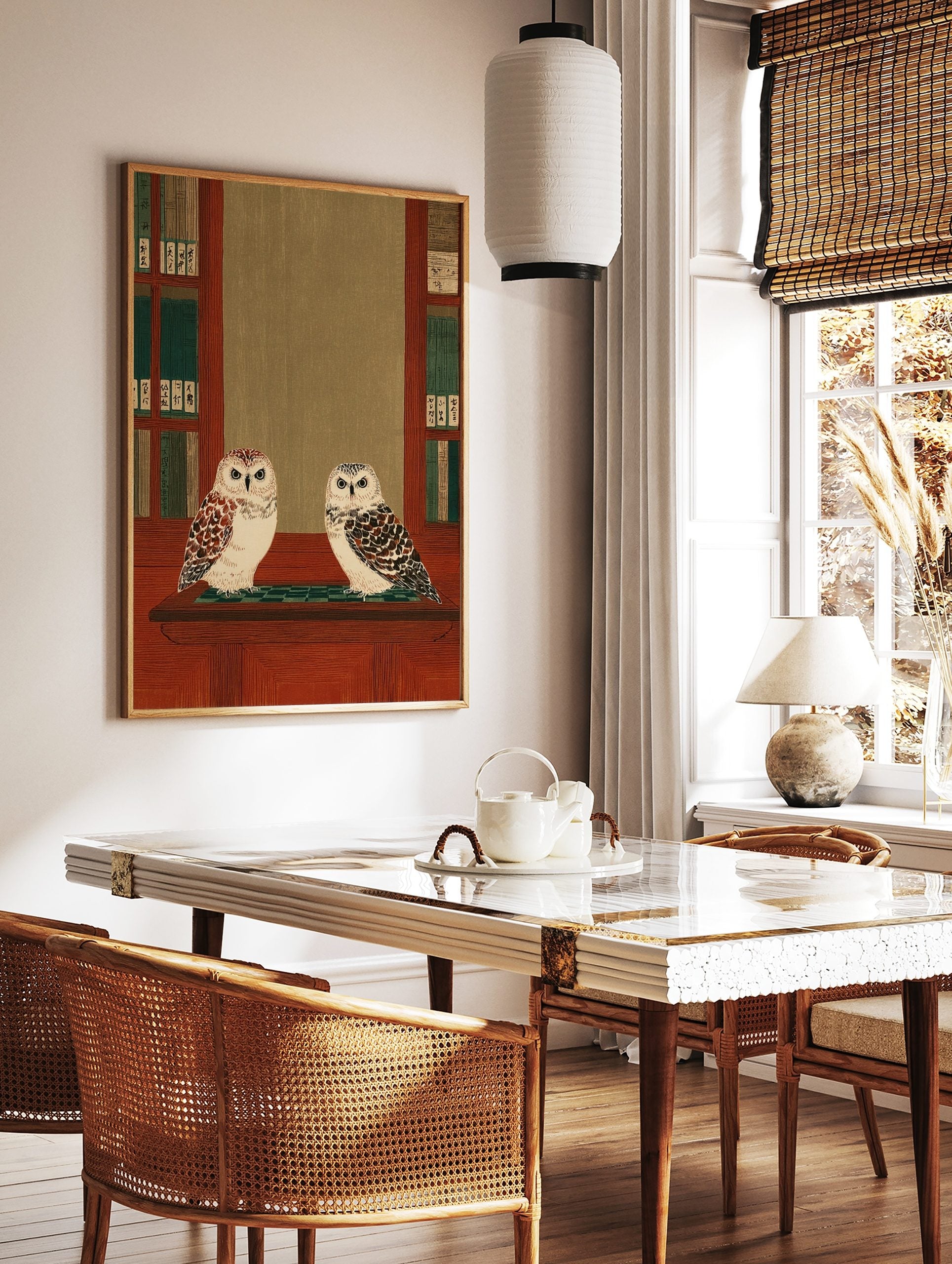 Two illustrative owls on a wooden shelf, flanked by bookshelves with green and Japanese character, in a styled room mockup