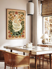 Illustrative white swans with long necks and black webbed feet, surrounded by orange and pink, in a styled room mockup