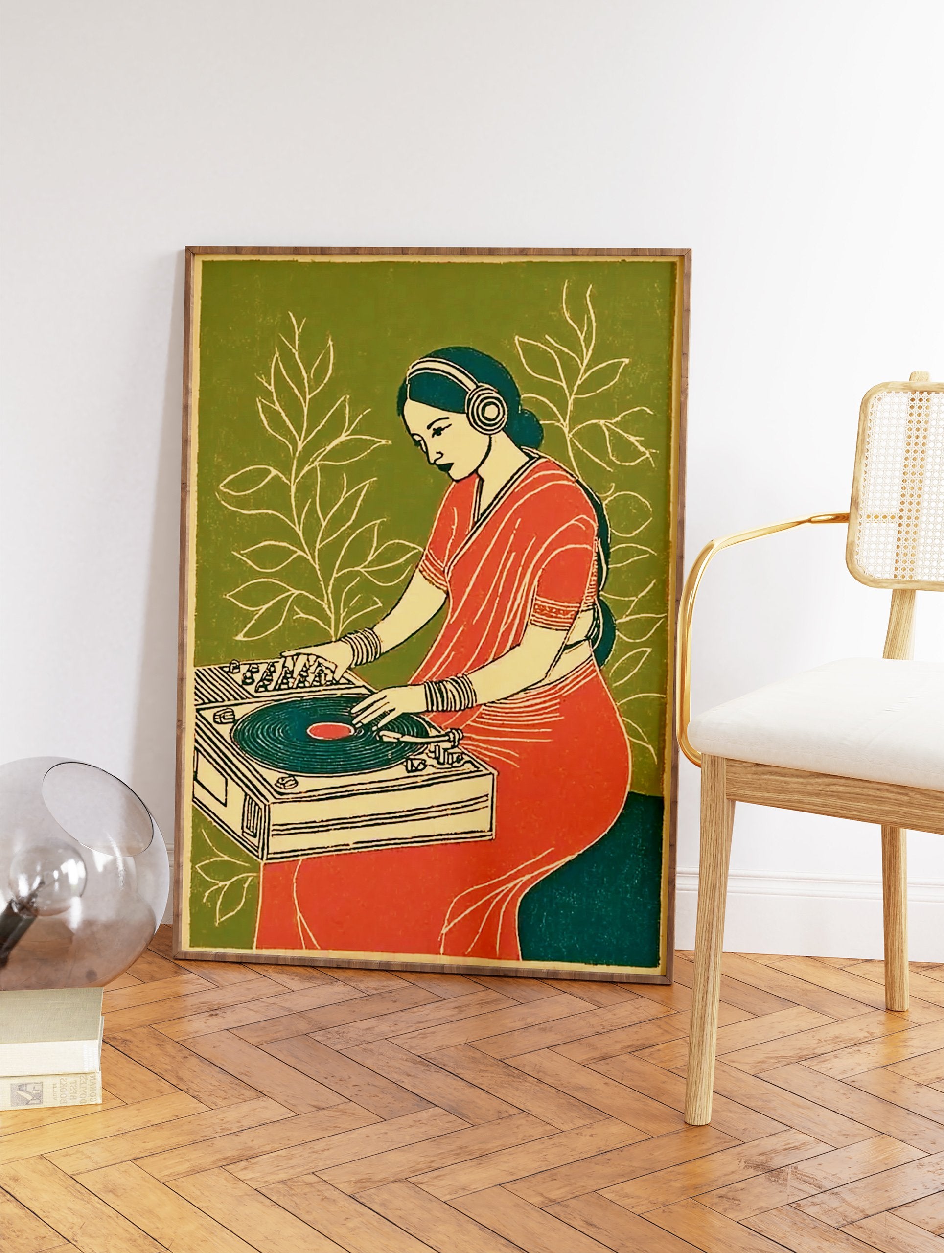 Stylized Indian woman DJing with headphones and red sari on a turntable against a green background with white leaves. Indian DJ Art Print. - Image 2