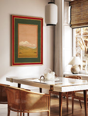 Traditional Indian landscape wall art painting with green hills, fields, peach sky, white clouds, and red & gold frame. - Image 2