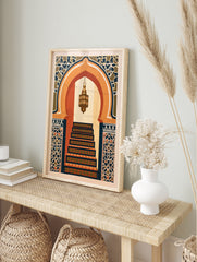 Illustrative print of a Moorish arched doorway with a hanging lantern and geometric tile, in an alternate framed mockup