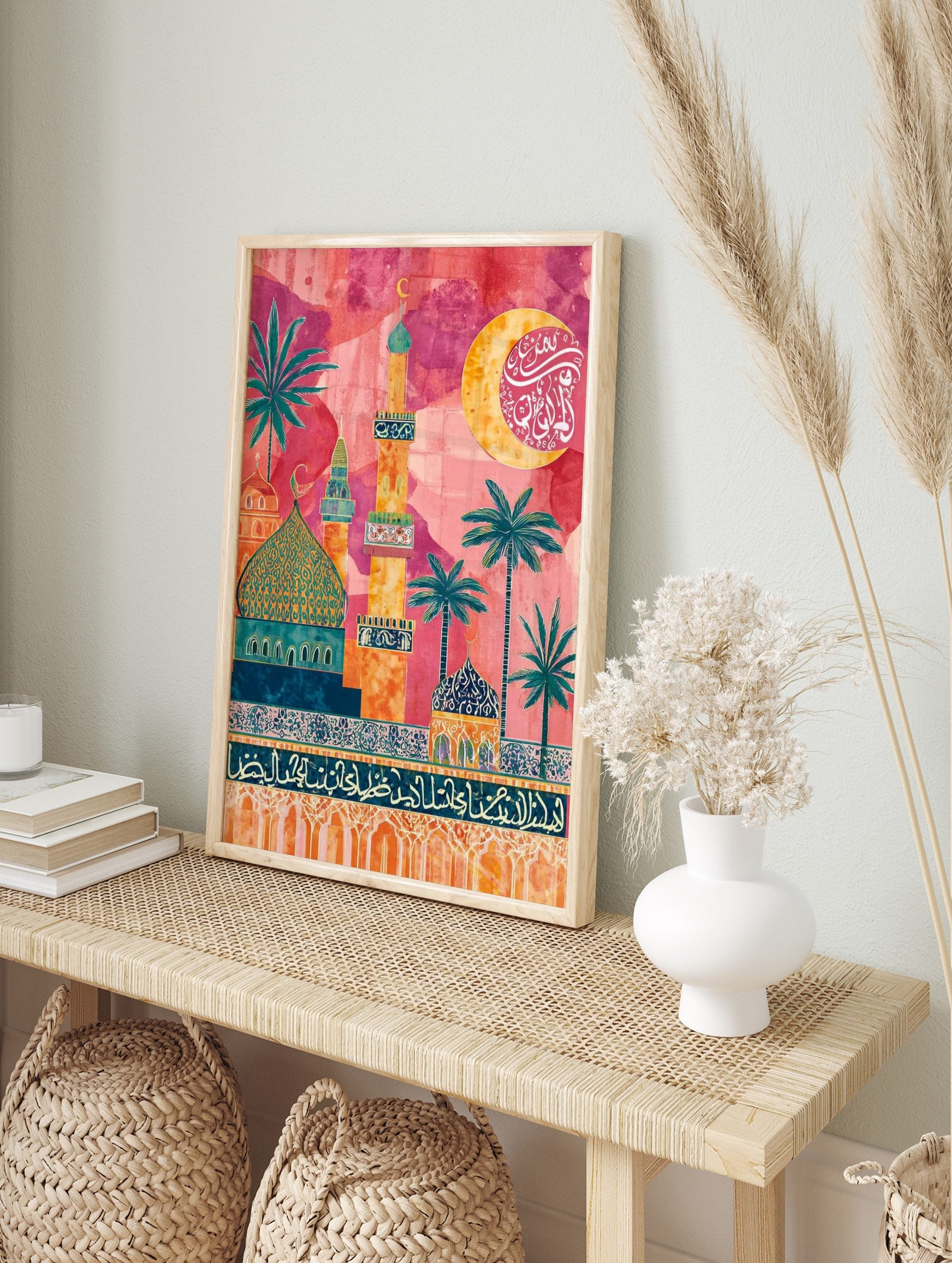 Colourful Islamic architecture wall art with mosques, minarets, palm trees, and Arabic, in an alternate framed mockup