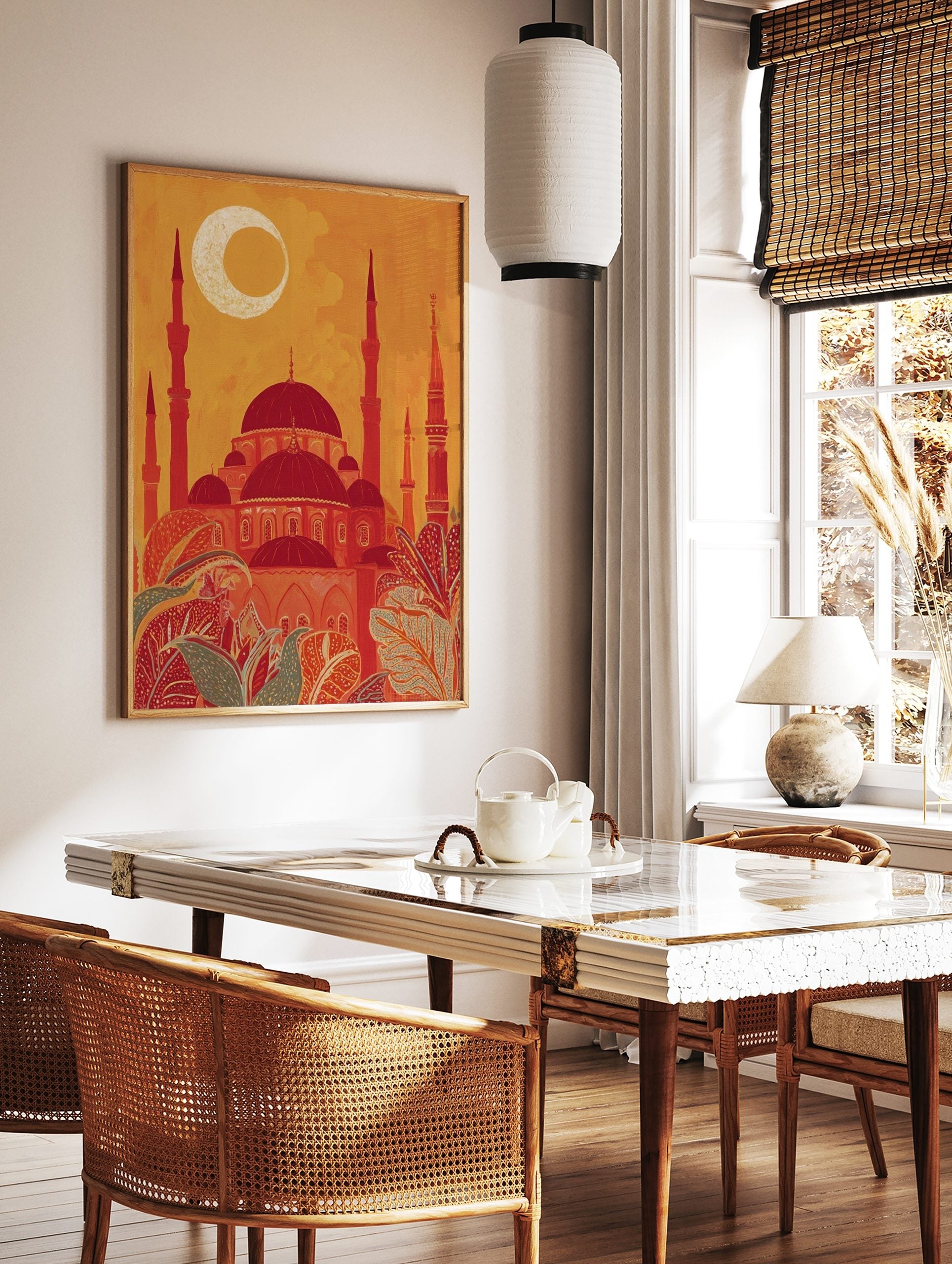 Stylised Islamic mosque with red domes, minarets, and crescent moon against an orange sky, with, in a styled room mockup