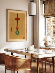 Jade bi pendant with red knot and calligraphy on tan textured background, in a styled room mockup