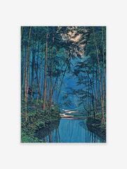 Japanese bamboo forest wall art with a blue river reflecting tall green trees and a small hut in the dense foliage.