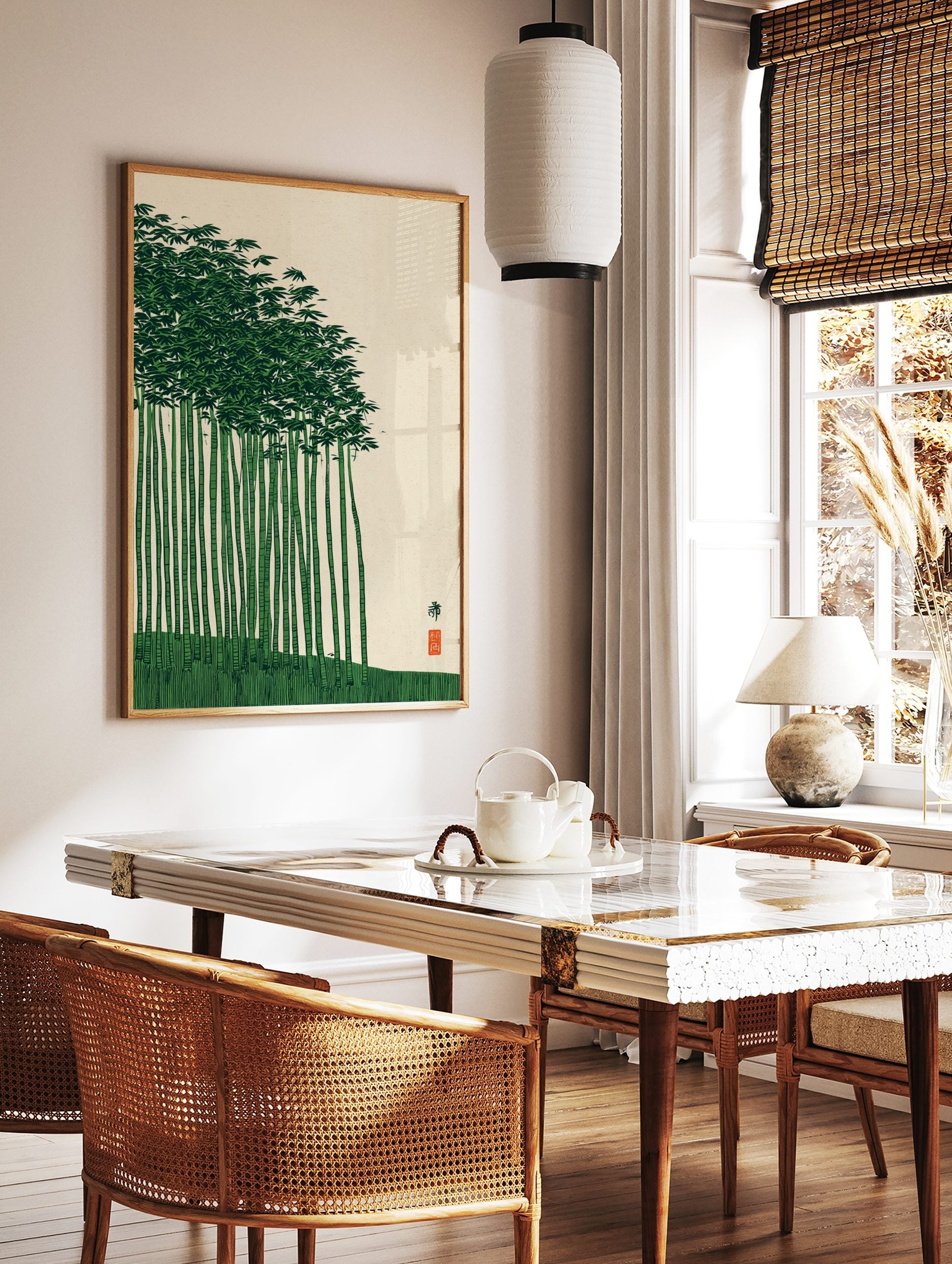 Japanese bamboo forest art print with green stalks, dense leaves, and a red seal on a cream, in a styled room mockup