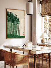 Japanese bamboo forest art print with green stalks, dense leaves, and a red seal on a cream, in a styled room mockup