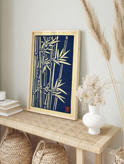 Japanese woodblock style wall art print featuring off-white bamboo stalks and leaves on a, in an alternate framed mockup