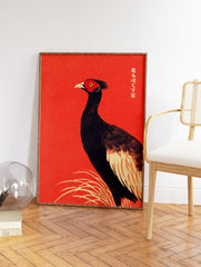 Japanese Ukiyo-e style bird wall art featuring a black pheasant with red face on a vibrant textured red background. - Image 2