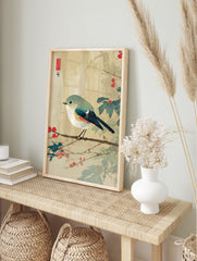 Japanese Ukiyo-e style print of a Red-flanked Bluetail bird on a branch with red berries and, in an alternate framed mockup
