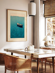 Japanese boat print showing a small wooden boat floating on calm blue water with a distant horizon and landmasses. - Image 2