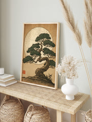 Stylised Japanese bonsai pine tree with green foliage and twisted brown trunk against a large, in an alternate framed mockup