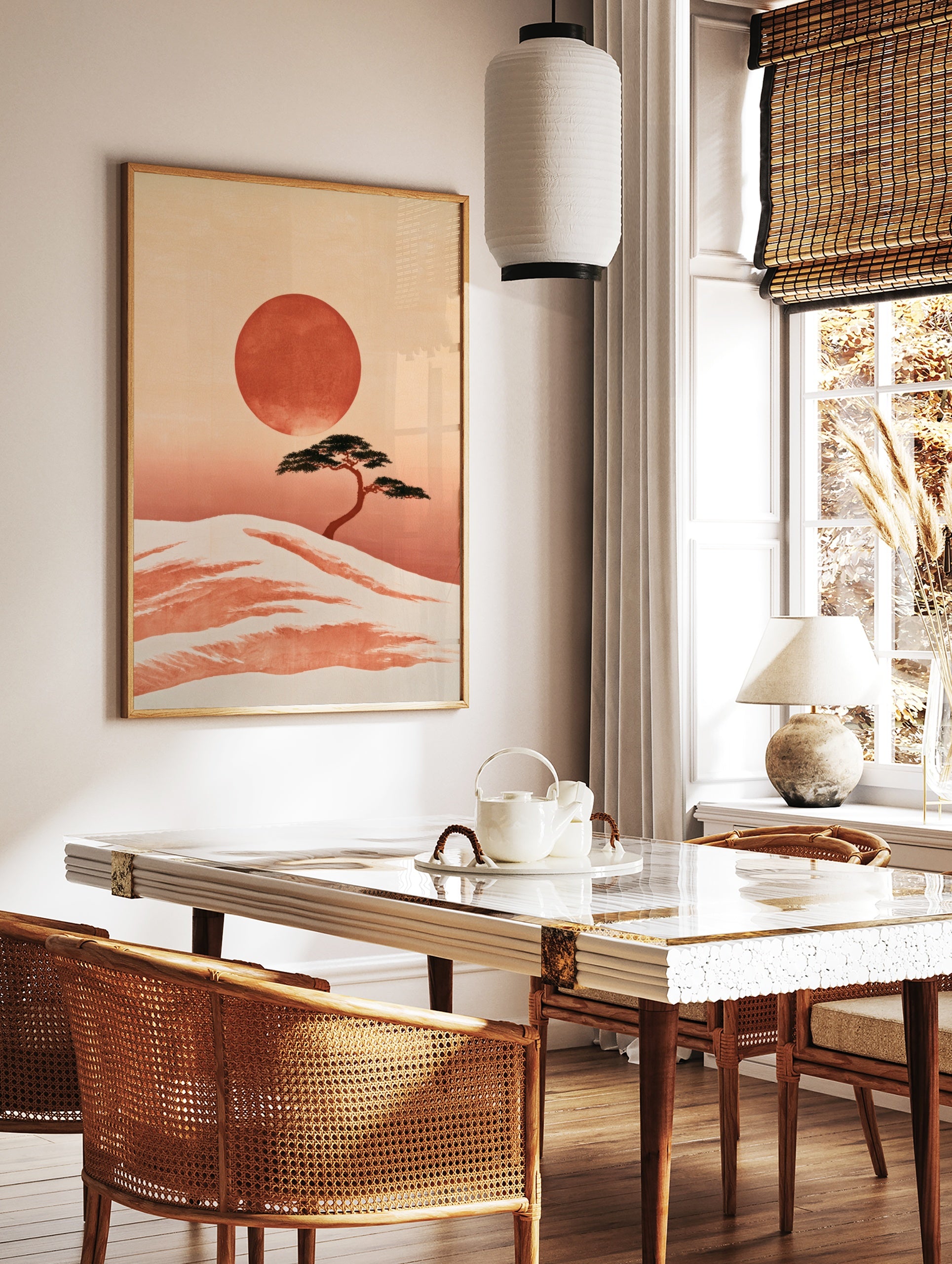 Minimalist Japanese landscape print featuring a bonsai tree on a sandy dune with a large red sun on, in a styled room mockup