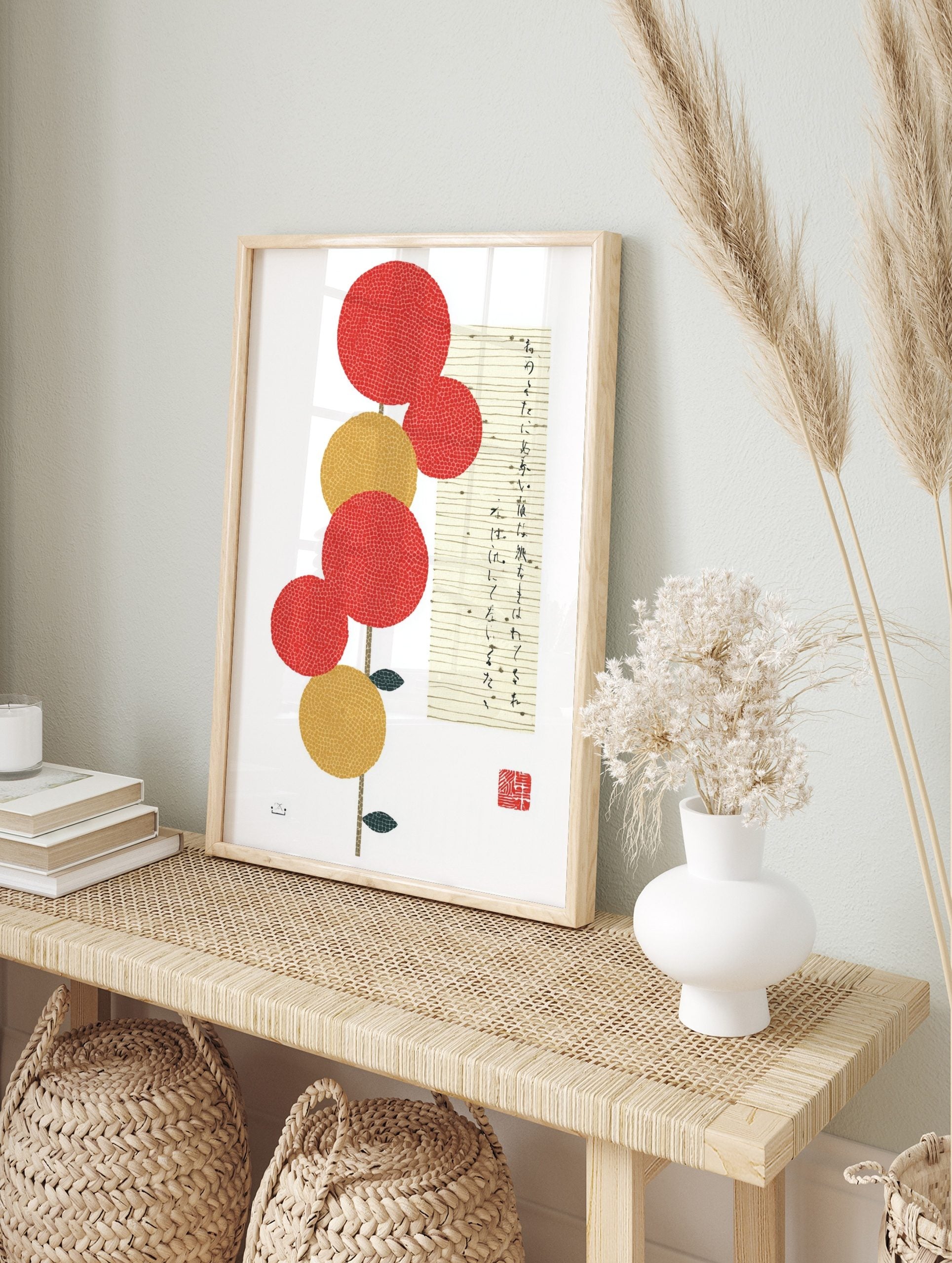 Japanese botanical art print with red and gold textured circles, stem, leaves, and vertical, in an alternate framed mockup