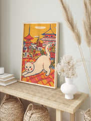 Vintage Japanese cat art print showing a white cat stretching on a red and orange tiled rooftop with pagodas in the background. - Image 3