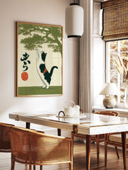 Japanese cat wall art print with a calico cat reaching up under a green tree silhouette, featuring Japanese script and a red circle. - Image 2