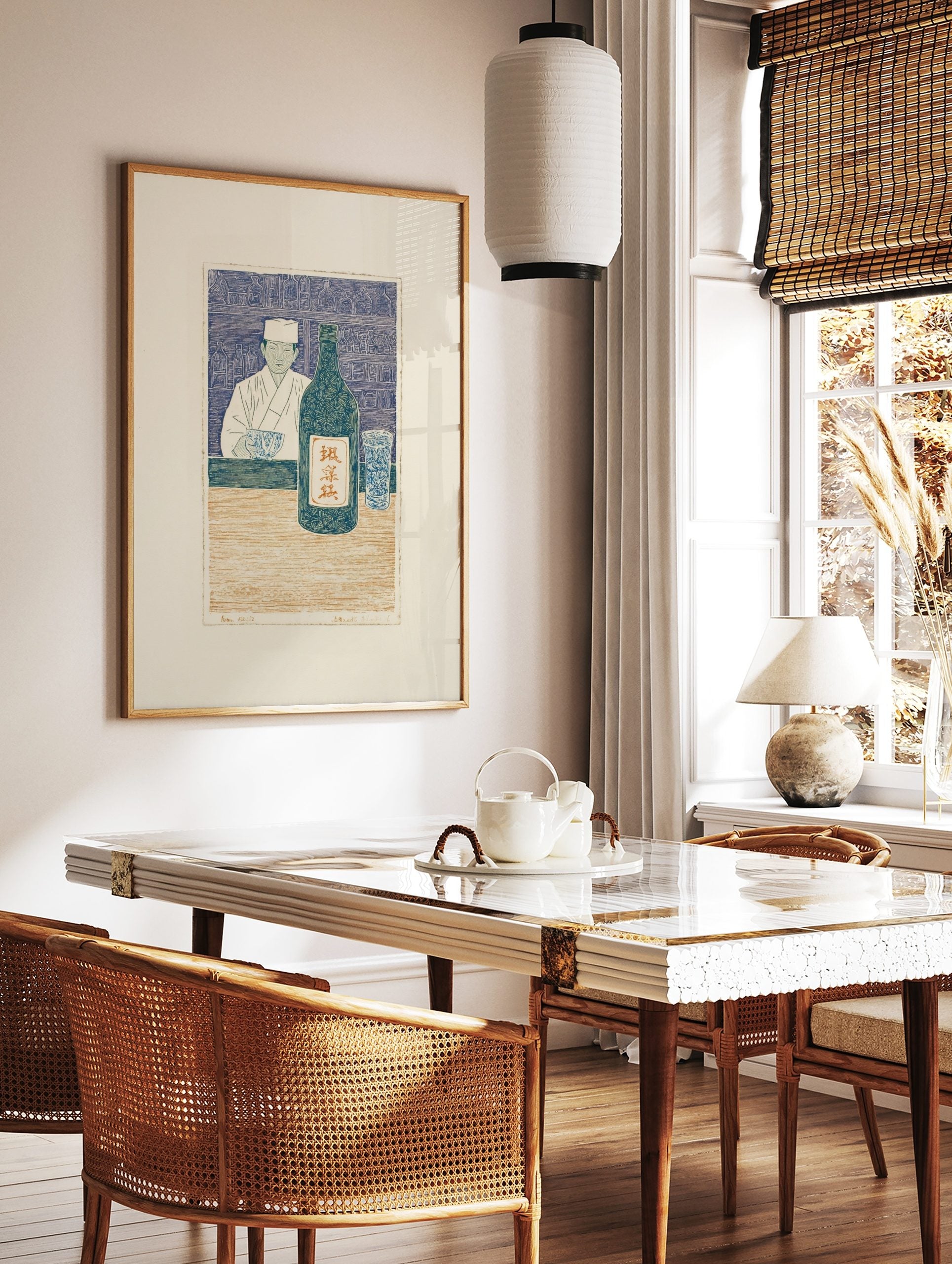 Japanese woodblock print of a chef with sake bottle and glass at a counter, in blue, cream, and, in a styled room mockup