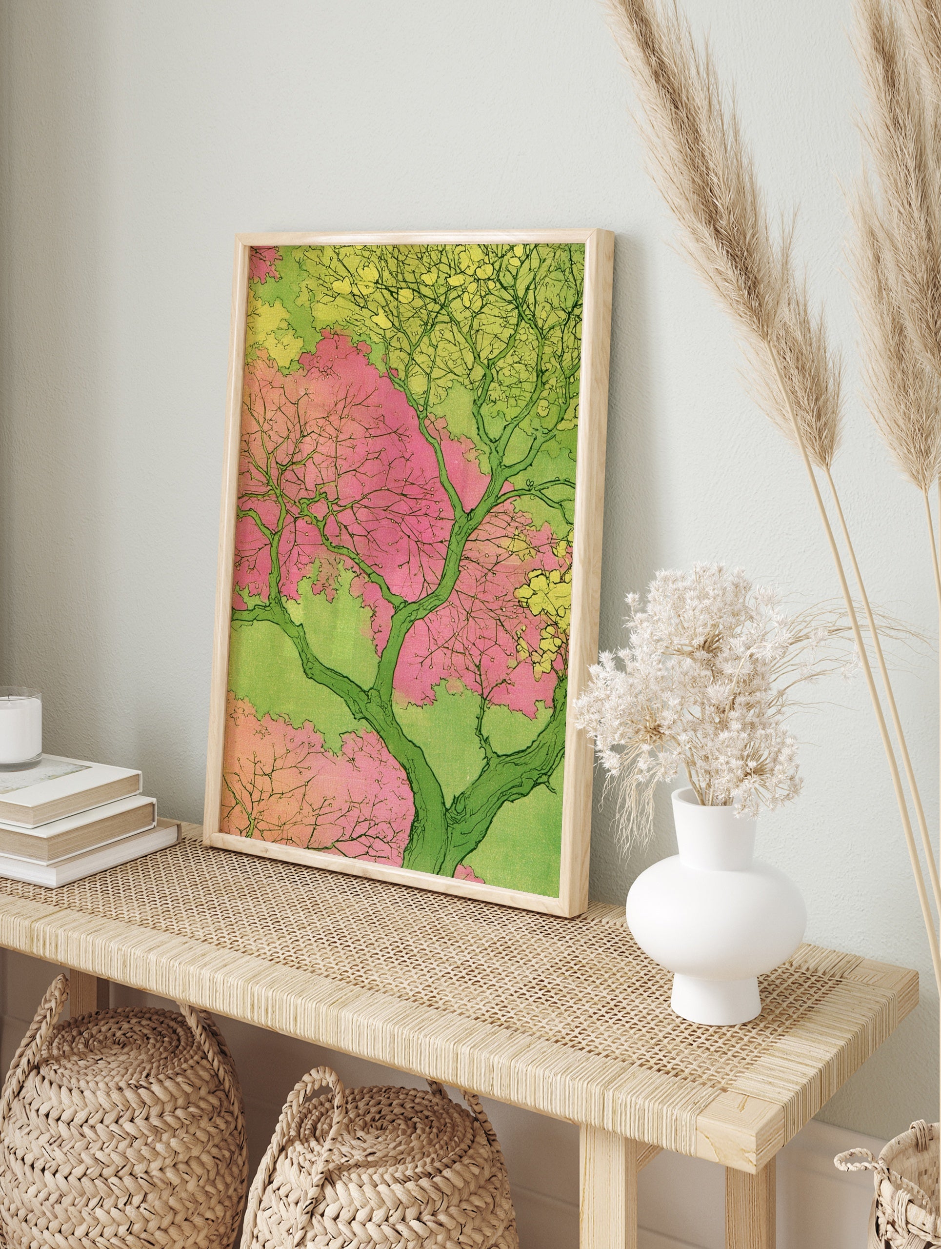 Japanese-inspired illustrative tree art print with pink blossoms and green foliage on a light, in an alternate framed mockup