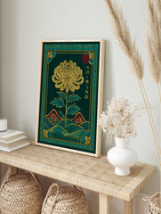 Japanese chrysanthemum flower wall art with yellow petals, green leaves, red mountains, and, in an alternate framed mockup
