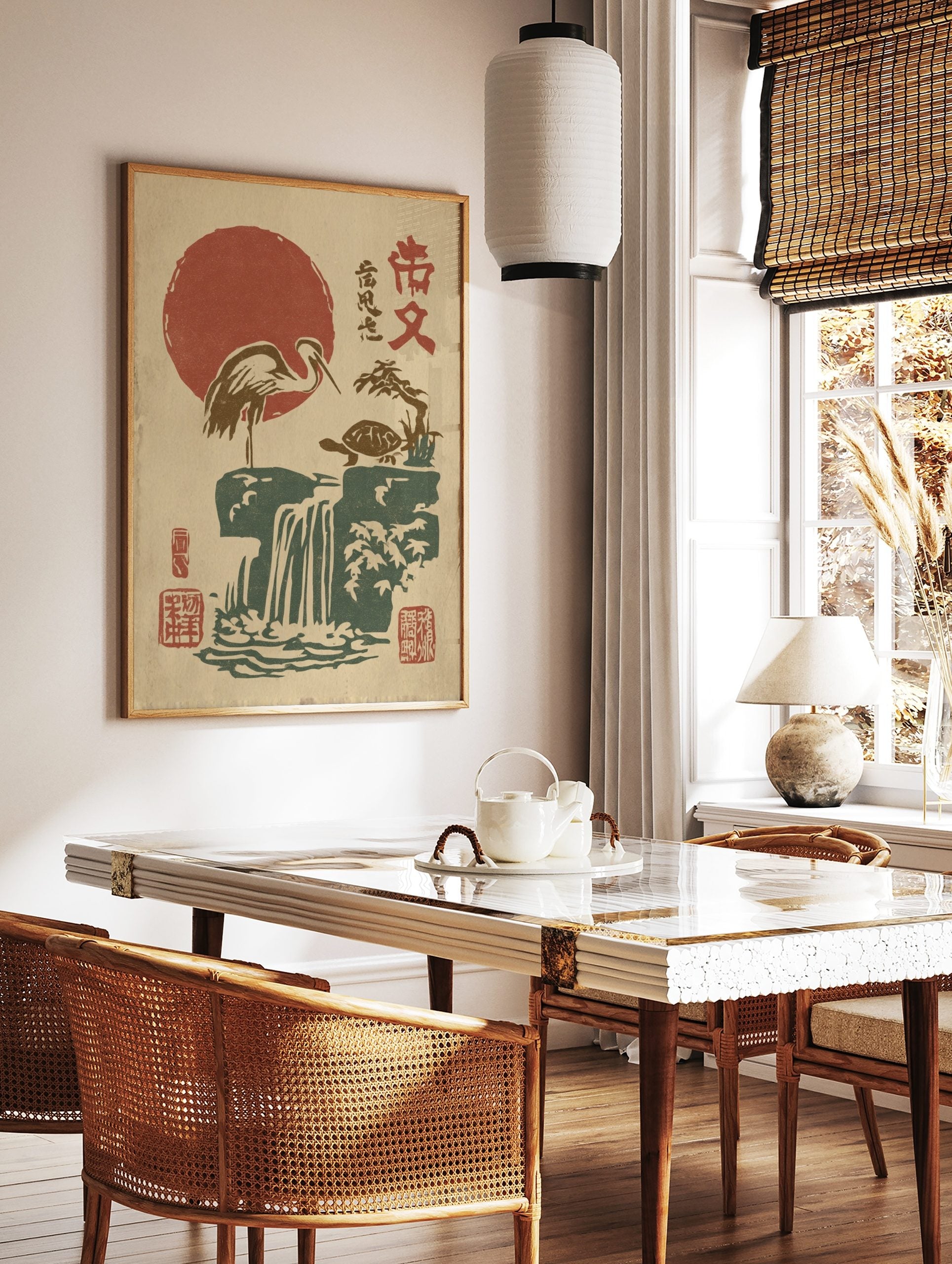 Japanese woodblock print of a crane and turtle by a waterfall under a red sun, with kanji text, in a styled room mockup