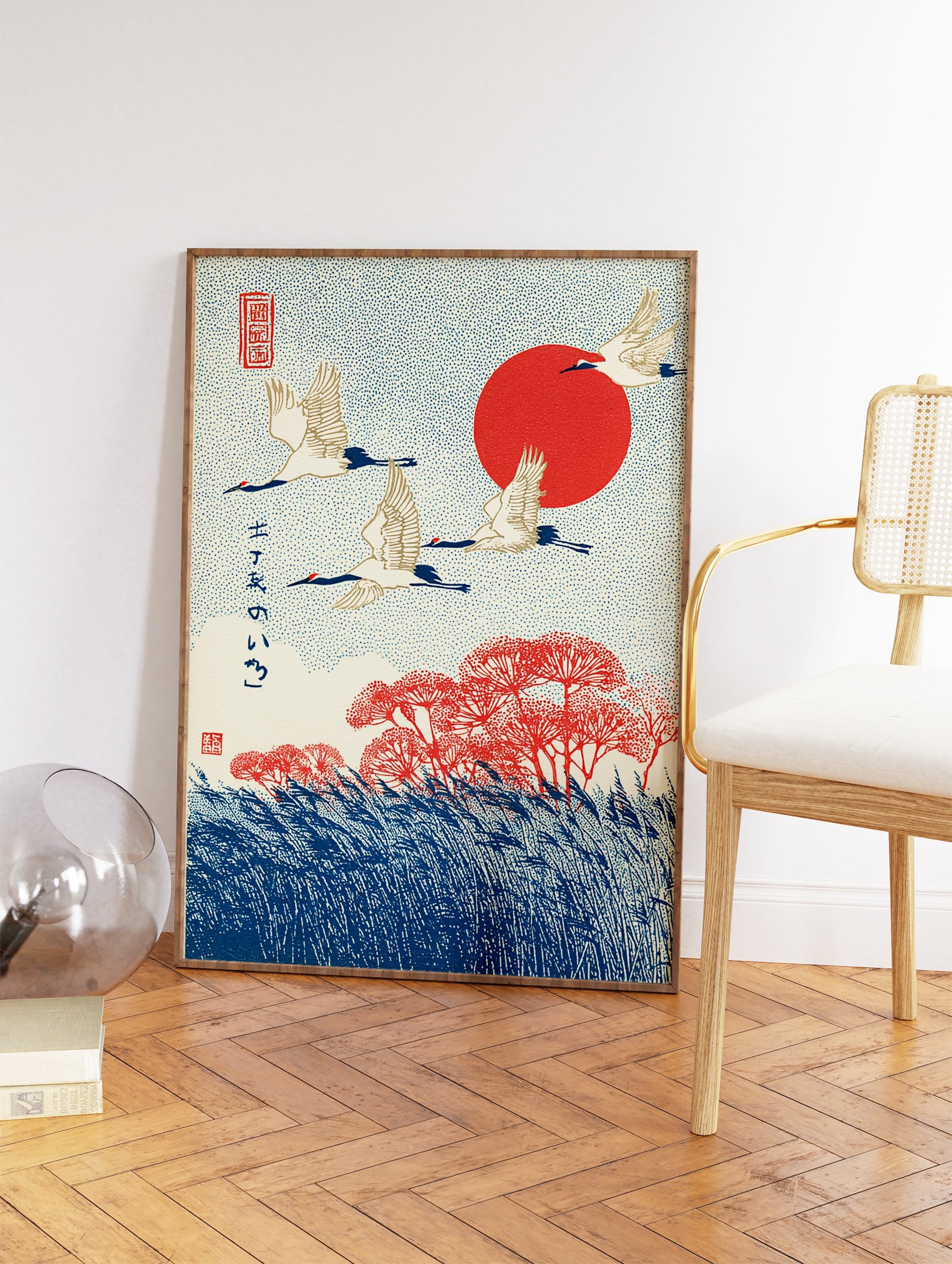 Japanese Crane Art print with three white cranes flying over red flowers and blue reeds against a red sun and dotted sky. - Image 2