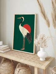 Japanese crane poster with a white body, black neck and tail, red head crest, and golden beak, standing in front of a red sun on a dark green background. - Image 4